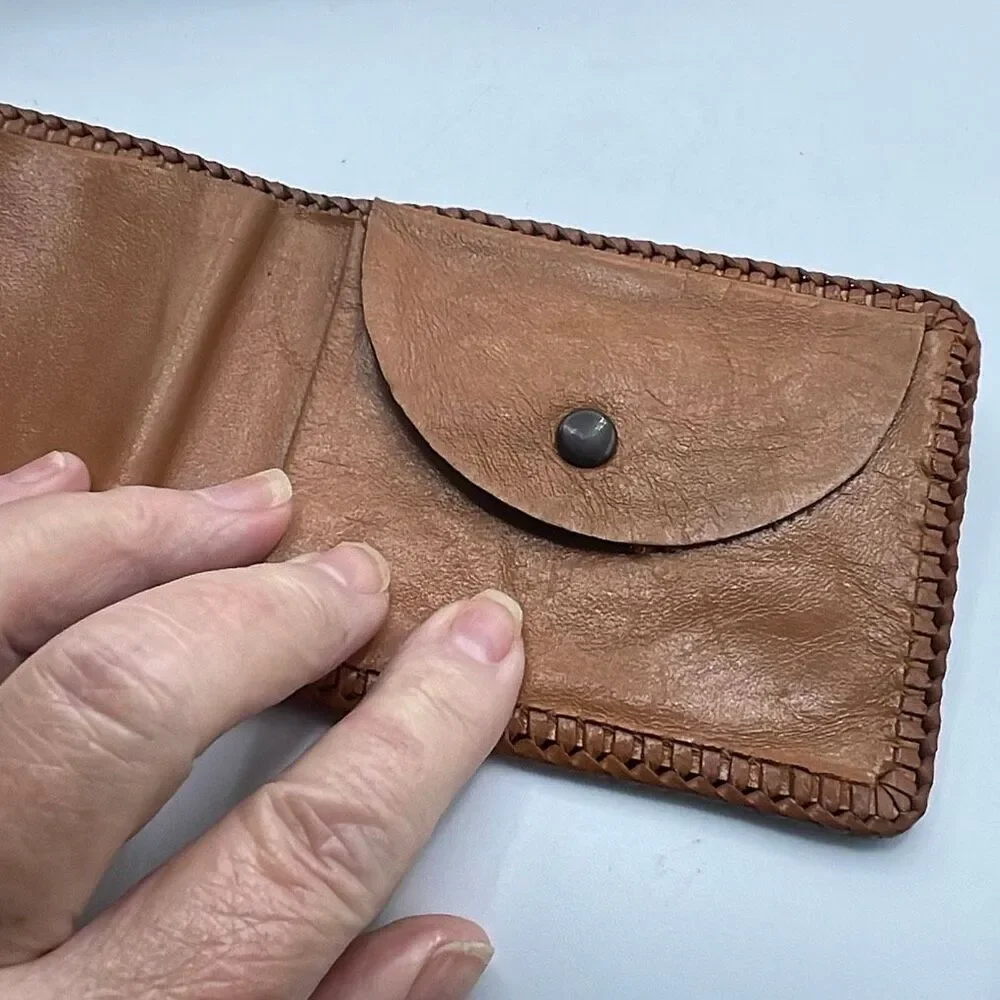 Vintage Handtooled leather Men’s wallet .